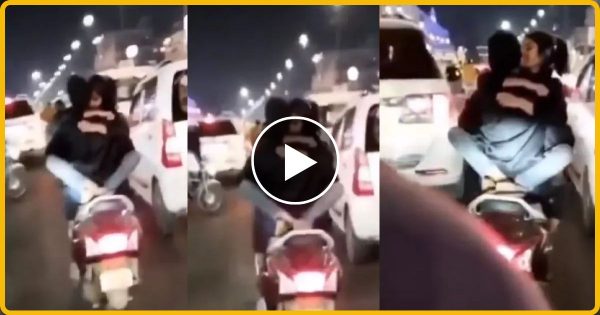 हजरतगंज में स्कूटी पर रोमांस कर रहे कपल का वीडियो वायरल, हुए गिरफ्तार